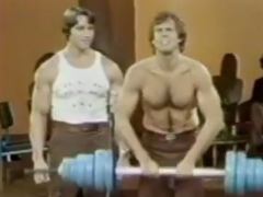 Arnold Shows Bill Boggs How To Exercise Image