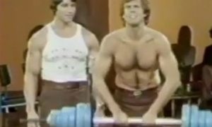 Arnold Shows Bill Boggs How To Exercise Image